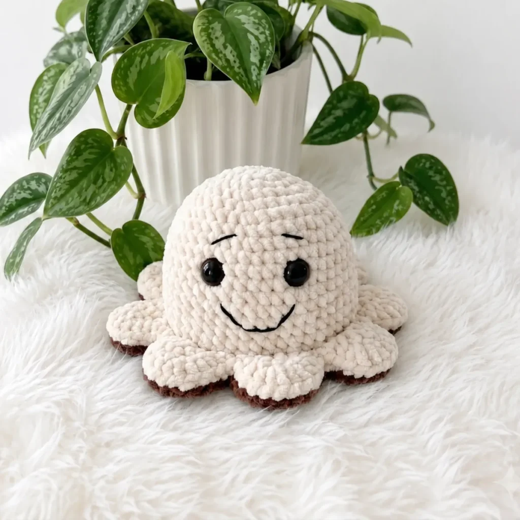 A reversible crochet octopus amigurumi for both sides
